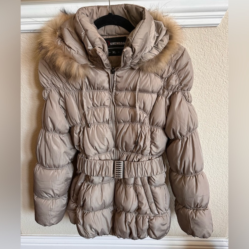 Like new!! Beige puffer jacket.